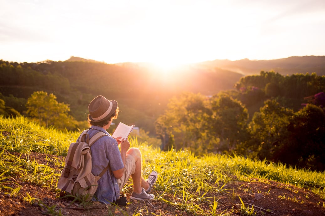 Reading a book in nature